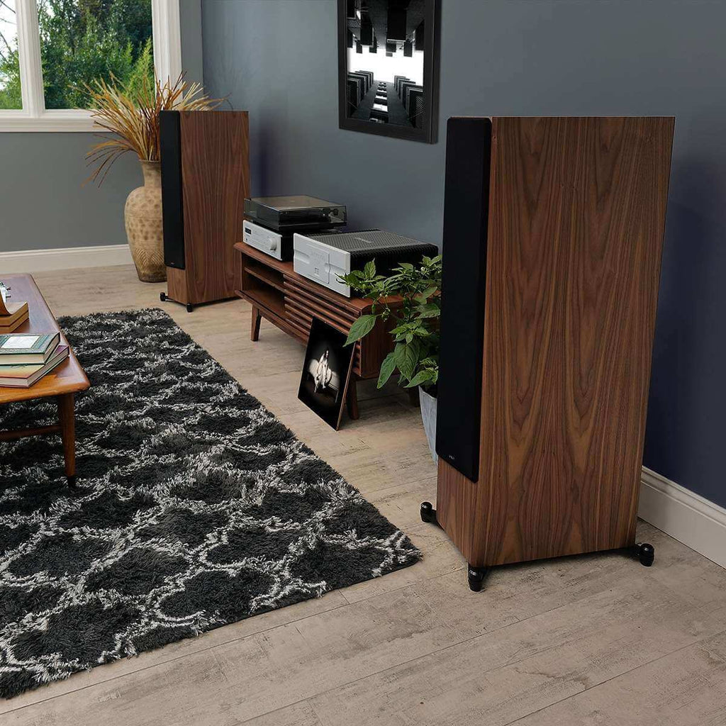 pair of walnut floorstanding speaker