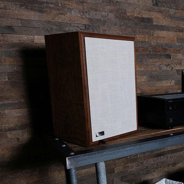 linen and walnut bookshelf speaker
