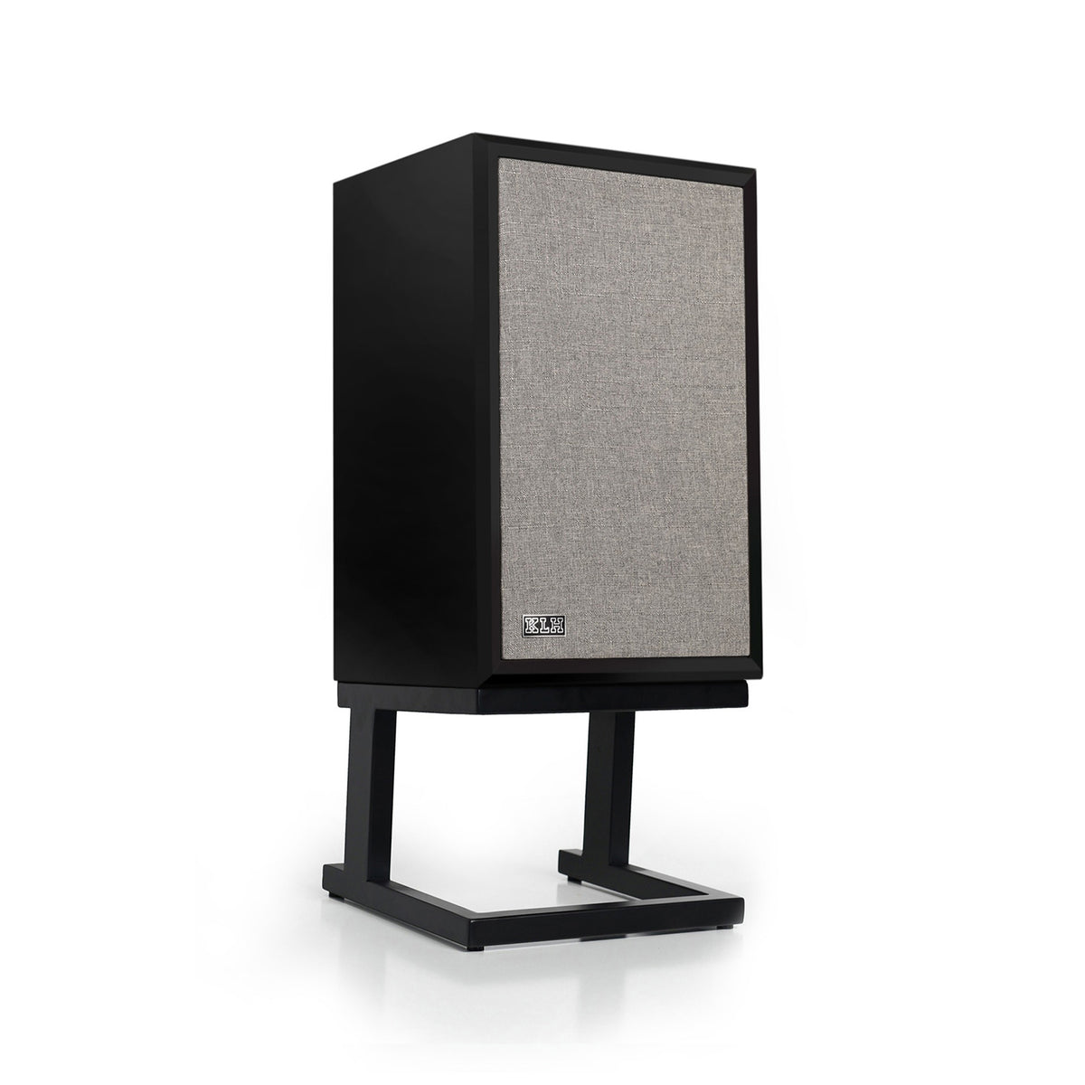 A black speaker on a matching black stand, featuring a textured gray fabric front grille, photographed against a clean white background.