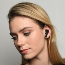 Maggie With Fusion True Wireless Earbuds In Left Ear